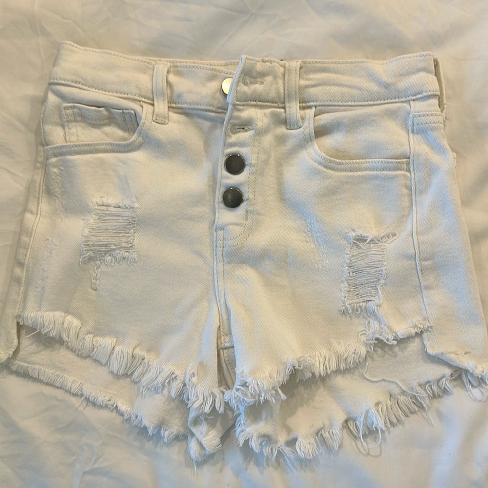 White shorts XS. Ripped